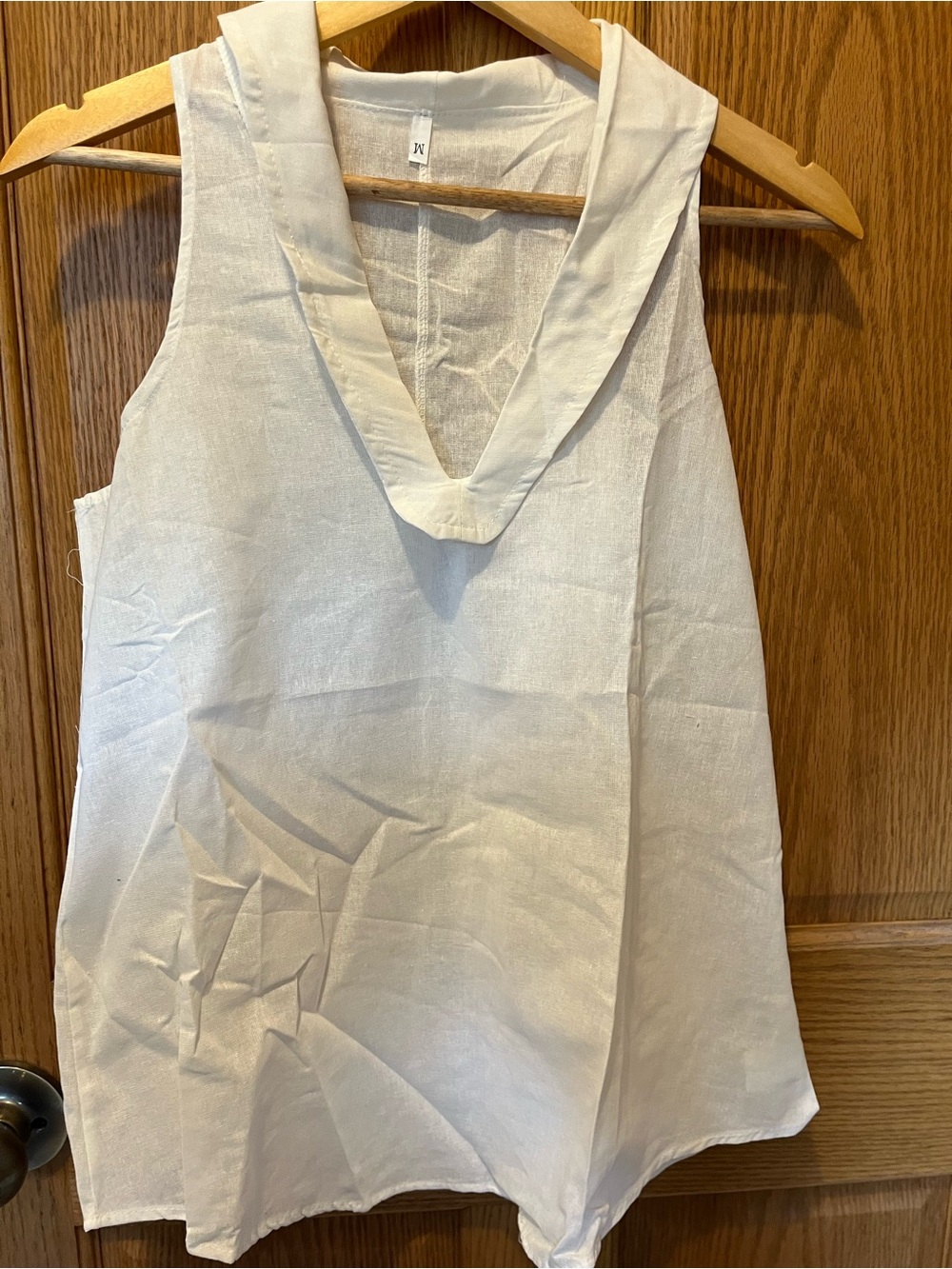 Women’s White V-Neck Linen Blend Tank Top and pants.